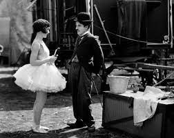 Pour quel film Charlie Chaplin obtient-il sa première récompense cinématographique ?