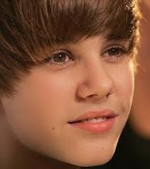 Quel symbole avait Justin pour la promotion de son film "Never Say Never" ?
