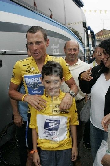 Quel est le prénom de son fils, né 2 mois avant sa disparition, que nous voyons sur la photo avec Lance Armstrong en 2005 ?