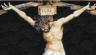 Sur la croix, l’inscription INRI indique :
