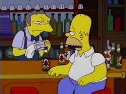 Comment s'appelle le gérant du bar que fréquente Homer ?