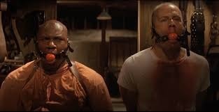 Dans "Pulp Fiction" (1994), quelle arme Butch choisit-il pour s'enfuir du donjon de Zed ?