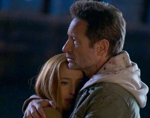 A la fin de la série, qu'est-ce que Scully annonce à Mulder ?
