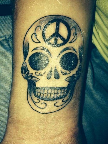 A qui appartient ce tatoo ?