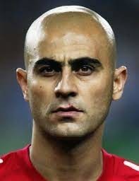 Ce milieu turc au crâne chauve, vedette de l'équipe nationale en 2002 ?