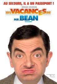 Dans le film "Les Vacances De Mr Bean", quel aliment glisse Mr Bean dans le sac d'une cliente au resto ?