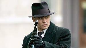 Johnny Depp campe le rôle du célèbre braqueur John Dillinger dans ce film de Michael Mann sorti en 2009 ?