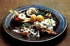 Rendez ce plat à son pays d'origine : Assortiment de filets de harengs marinés