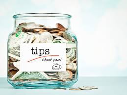 Are you giving Tips to the waiter in France ?