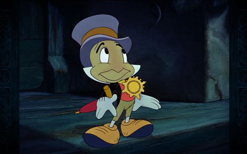 Qui donne à Jiminy Cricket une médaille de "conscience officielle" ?
