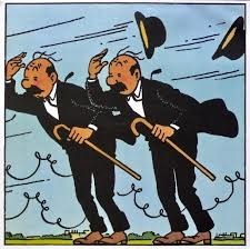 Dans les albums de Tintin, comment peut-on distinguer Dupont et Dupond ?