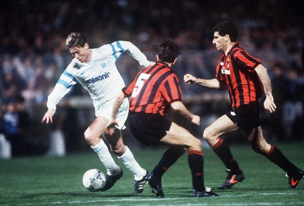 En 1991, à quel stade de la compétition l'OM a-t-il éliminé l'AC Milan de la Coupe d'Europe des Clubs Champions ?