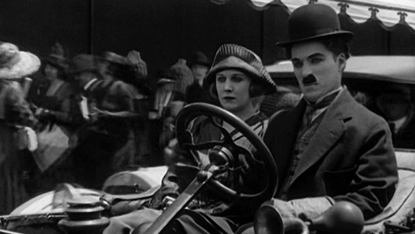 Dans ce court-métrage de 1919, Chaplin a une femme et des enfants. Il s'agit de ?