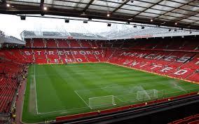 Comment s'appelle le stade de Manchester United ?