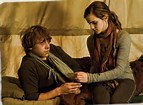 Qui embrasse Hermione devant Harry dans le dernier livre ?