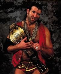 Scott Hall, mort le 14/03, catcheur des années 90 connu également sous quel nom ?
