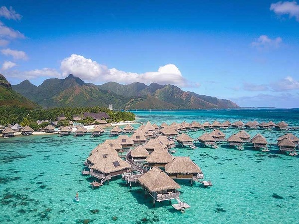 Comment surnomme-t-on Moorea, voisine de Tahiti ?