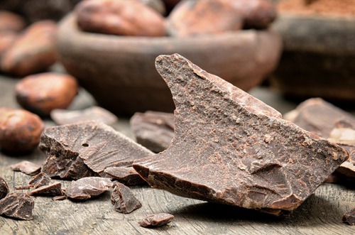 Le "blanchiment" du chocolat suite à des conditions de conservation inadaptées dûes à des variations de température, est dû à :