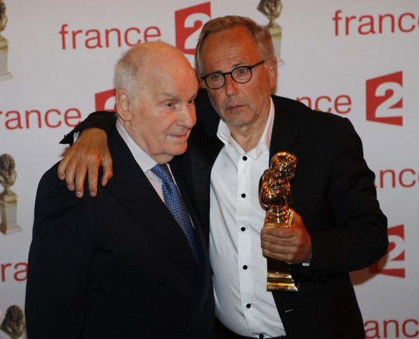 En 2014, quel célèbre acteur français lui remet un molière d’honneur pour son jeu dans la pièce Tartuffe mise en scène par Michel Fau ?