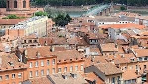 Le mot brique n'est pas un terme typique de Toulouse, quel est le nom originel de ce matériau ?