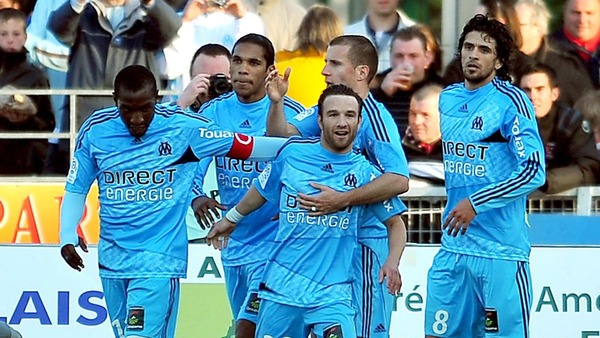 En 2010, qu'est-ce que Mathieu a remporté avec l'OM ?